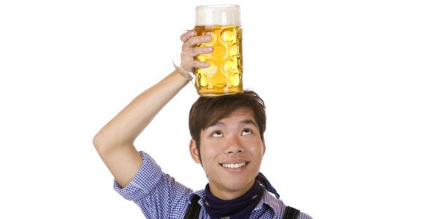 man with beer on his head 