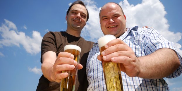 http://www.dreamstime.com/royalty-free-stock-photography-two-men-holding-beer-image5589737