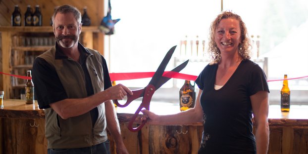 Sean Turner, Joyce Turner from Mammoth Brewing cut the ribbon to open the tasting room.