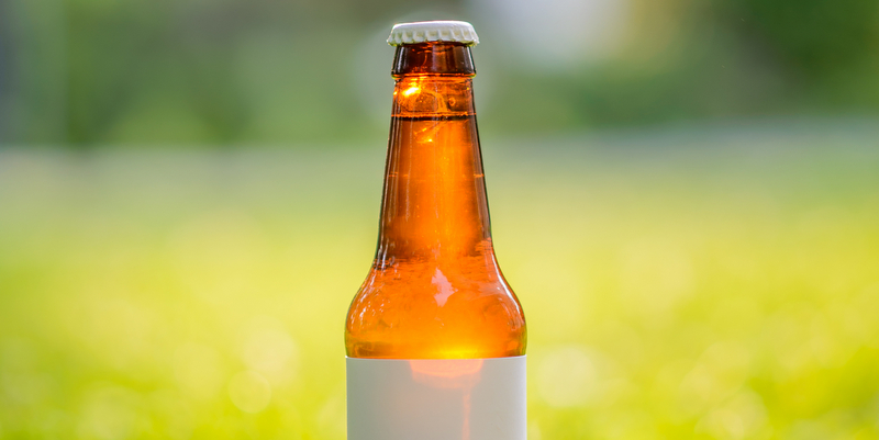 beer bottle blank label outside grass cbb crop