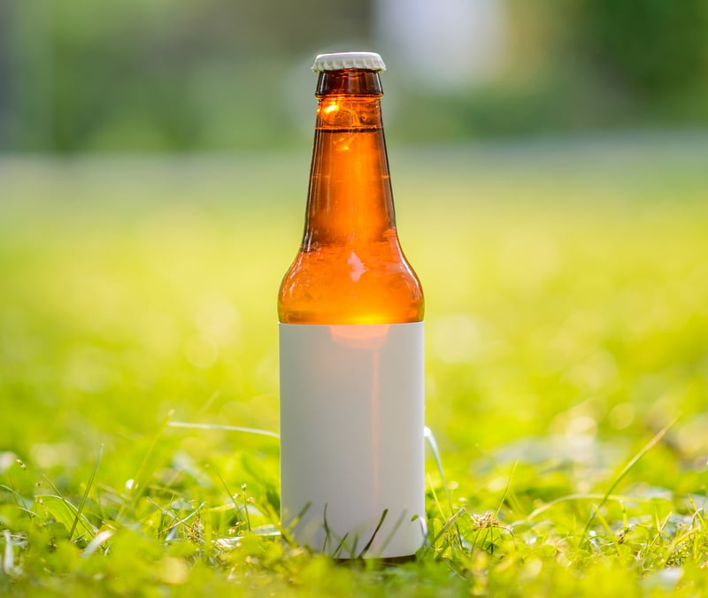 beer bottle blank label outside grass