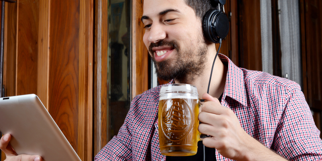 beer drinker headphones computer listening