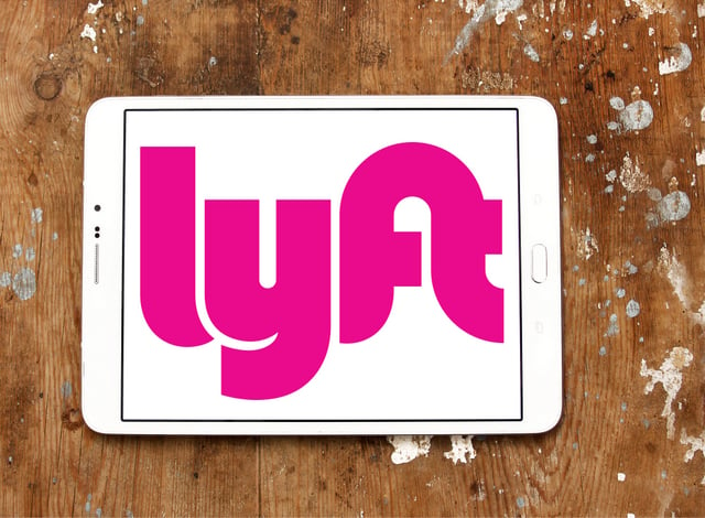 Lyft ride sharing tablet wood table 