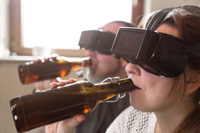 VR couple drinking beer virtual reality 