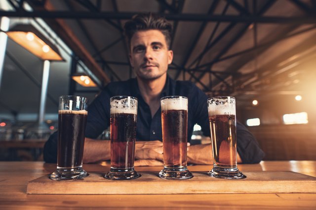 brewer man with beer bar sampler samples business brewery 