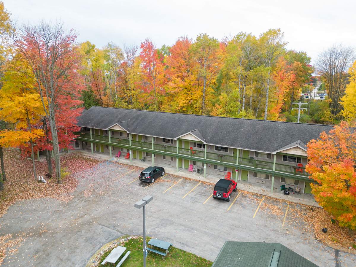 Short's Brewing Bellaire Inn ariel view with fall colors in the trees