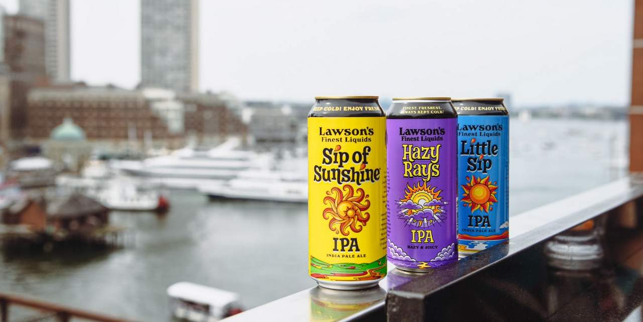 Lawson's Finest Liquids beers overlooking a harbor