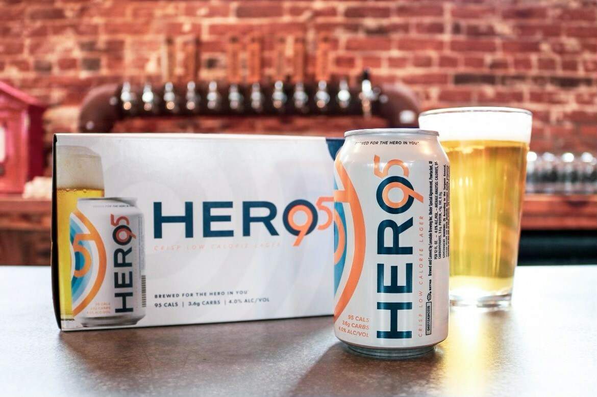 Hero95 beer 12 pack and can with glass of beer
