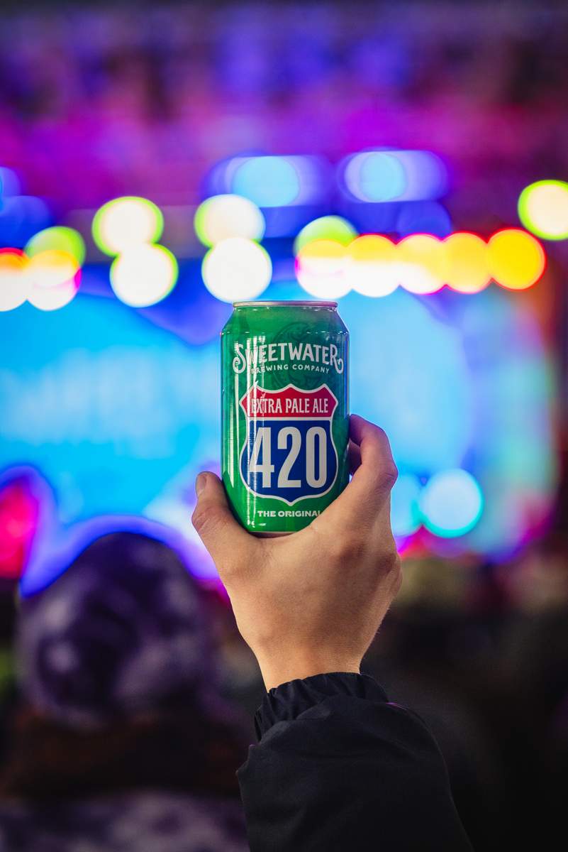 SweetWater 420 brand can at a concert 